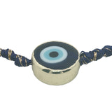 Bracelet doré cordon bleu marine oeil rond cerclé de doré