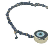 Bracelet doré cordon bleu marine oeil rond cerclé de doré