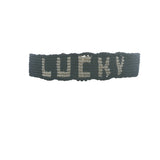 Bracelet brésilien doré fil tissé bleu marine et crème "lucky"