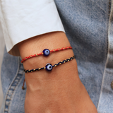 Braided bracelet and blown glass eye