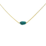 Gold necklace and turquoise stone