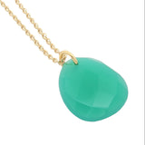 Gold necklace with faceted natural stone not set