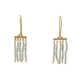 Golden earrings with a cascade of stones and zircons
