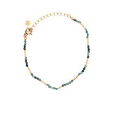 Bracelet doré en multi turquoise et tubes dorés