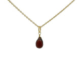 Gold necklace and faceted drop stone