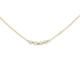Golden necklace with natural stones and golden pearls