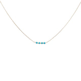 Golden necklace with natural stones and golden pearls