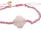 Gold cord bracelet with clover and faceted stone