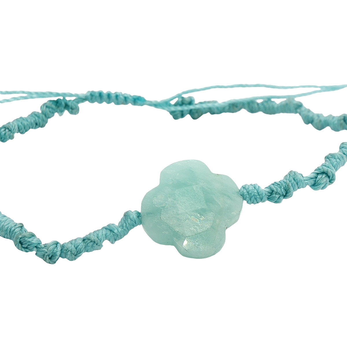 Gold cord bracelet with clover and faceted stone
