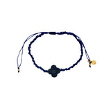 Gold cord bracelet with clover and faceted stone