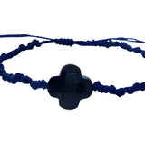 Gold cord bracelet with clover and faceted stone