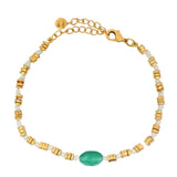 Stone cord bracelet and gold discs