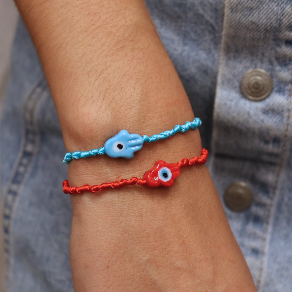 Colorful cord bracelet and blown glass hand of Fatima