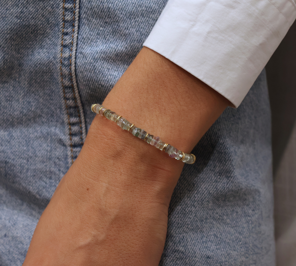 Gold bracelet and heishi stones