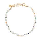 Gold necklace and stone clover