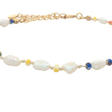 Gold necklace and stone clover