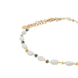 Gold necklace and stone clover