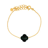 Golden clover bracelet with faceted stone