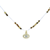 Collier doré fil blanc oeil de tigre facettées et oeil zircons 42cm