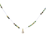 Collier doré fil blanc rubis zoisite facettées et pendentif zircon 42cm