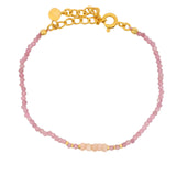 Golden bracelet with natural stones