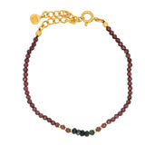 Golden bracelet with natural stones