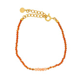 Golden bracelet with natural stones