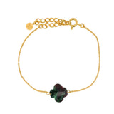 Golden clover bracelet with faceted stone