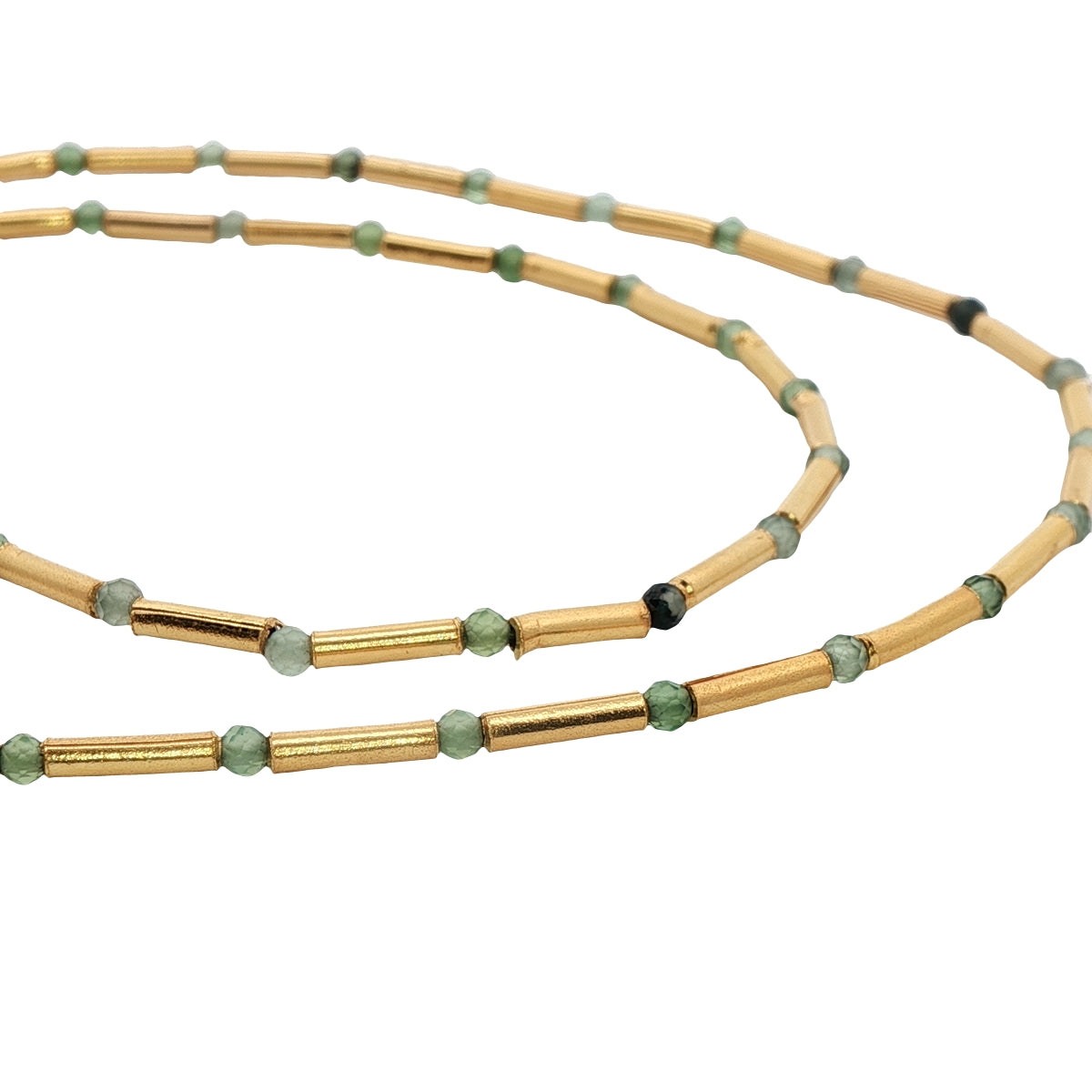 Necklace with golden rods and natural stones