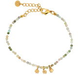 Bracelet with guilloche stones and flower tassels