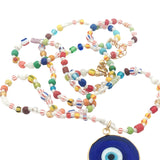 Collier doré oeil bleu perles multicolores 75 cm