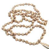 Collier poisson doré perles en bois beige 75 cm