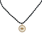 Collier médaillon doré oeil en zircons perles en bois marron 90 cm