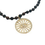 Collier médaillon doré oeil en zircons perles en bois marron 90 cm