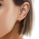 Mini gold hoop earrings with diamond-shaped zircons