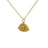 Gold necklace with hammered eye and stone pendant