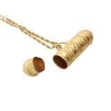 Collier doré talisman cylindrique estampillé 60 cm