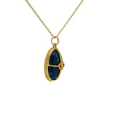Collier doré cabochon pierre lapis , cage dorée et oeil