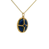Collier doré pierre lapis cabochon et cage dorée