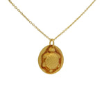 Collier doré et pendentif mate tortue estampillée
