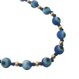 Collier doré perles oeil bleu, perles dorées et noeuds bleu marine 42 cm