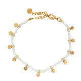 Gold bracelet with tassels and stones