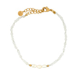 Golden bracelet with pearls and stones