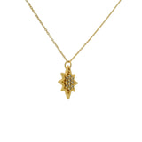 Gold necklace with compass rose pendant and zircons