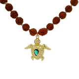 Collier rudraksha et tortue dorée avec zircons 84 cm