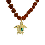 Collier rudraksha et tortue dorée avec zircons 84 cm
