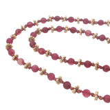 Collier doré perles grenat et couronnes dorées 42 cm