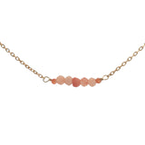 Gold choker necklace with natural stones