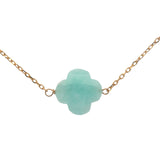 Gold clover necklace with faceted stone