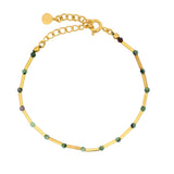 Bracelet doré rubis zoisite alterné avec des tubes dorés